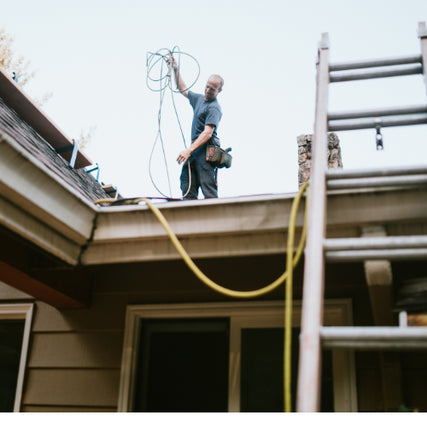 Contractor RentalsContractor working on roof