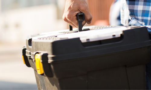 Man carrying toolbox